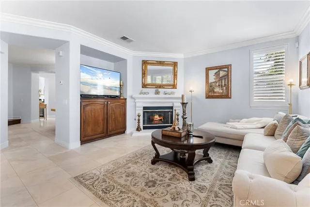 a bedroom with a bed and a chair