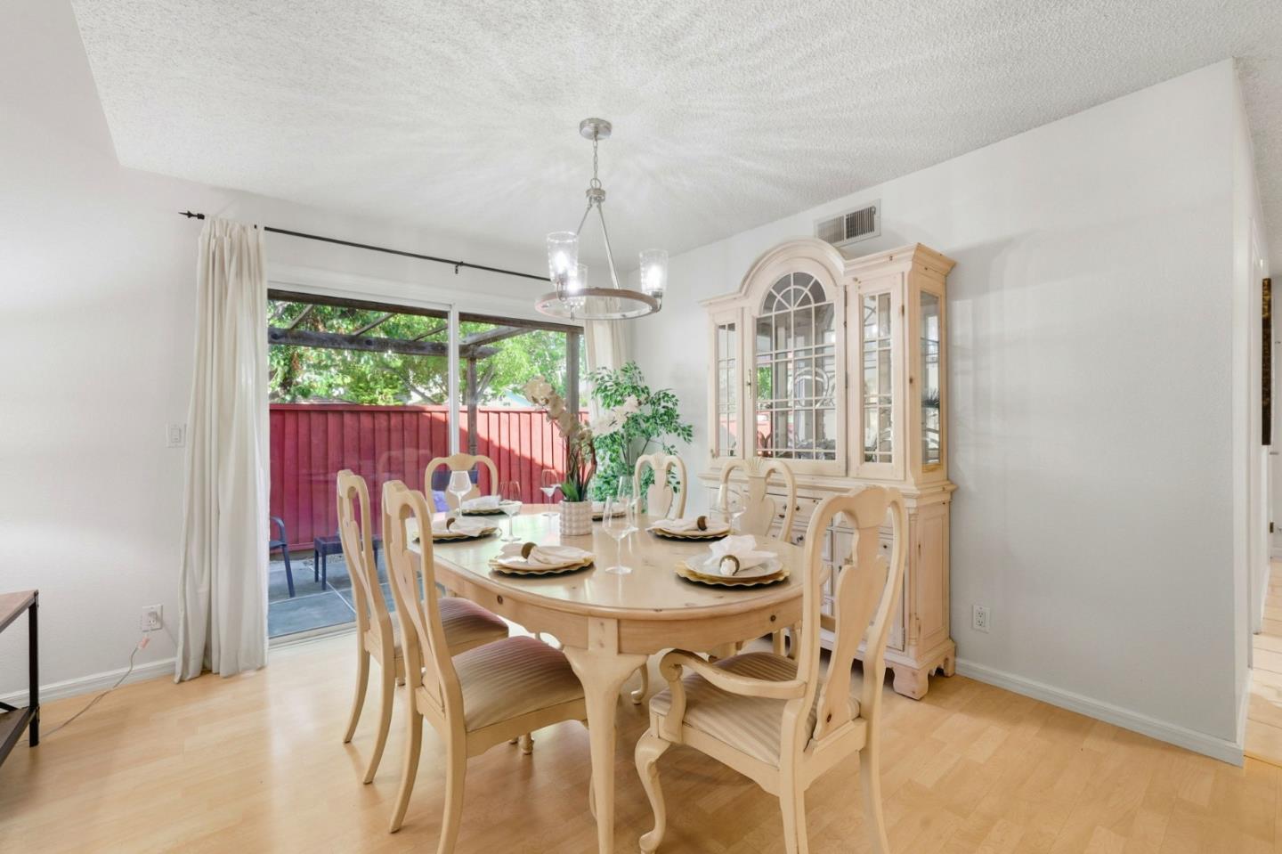 2327 Farmcrest Street Milpitas, CA 95035 - Photo 15 of 36 a view of a dining room with furniture window and outside view