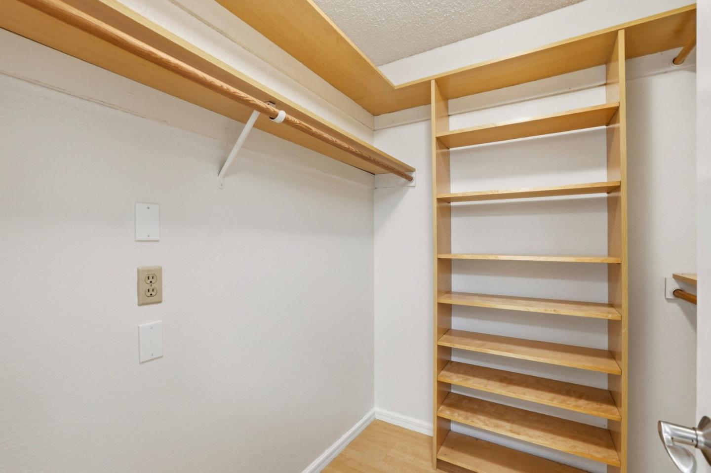 2327 Farmcrest Street Milpitas, CA 95035 - Photo 24 of 36 a view of walk in closet with empty racks