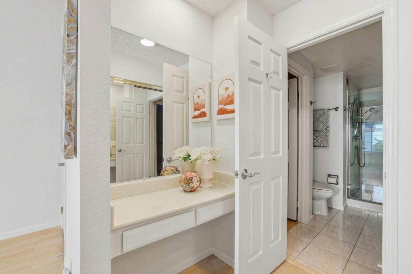 2327 Farmcrest Street Milpitas, CA 95035 - Photo 27 of 36 a bathroom with a sink and a mirror