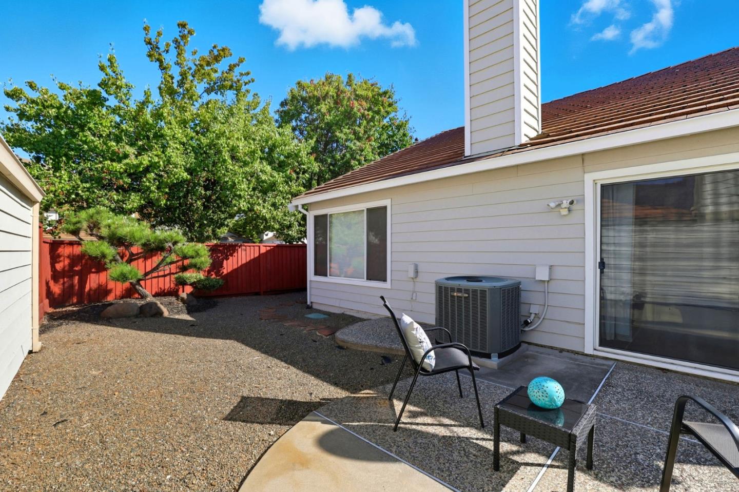 2327 Farmcrest Street Milpitas, CA 95035 - Photo 34 of 36 a view of a chairs and tables in the back yard of the house