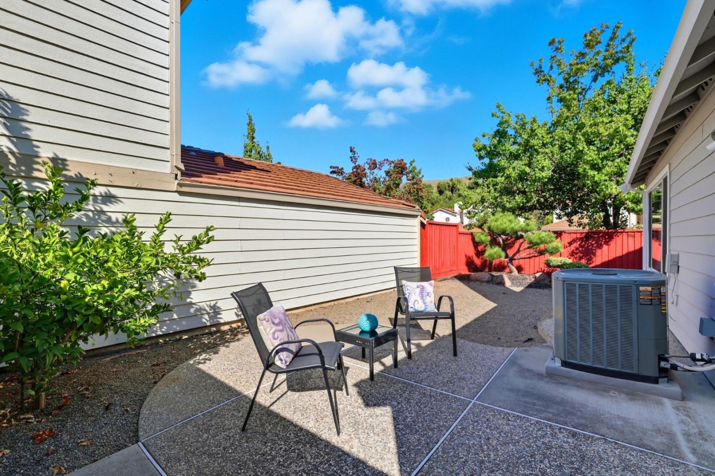 2327 Farmcrest Street Milpitas, CA 95035 - Photo 35 of 36 a view of a chairs and table in the backyard