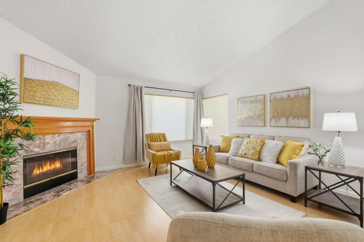 2327 Farmcrest Street Milpitas, CA 95035 - Photo 6 of 36 a living room with furniture and a fireplace