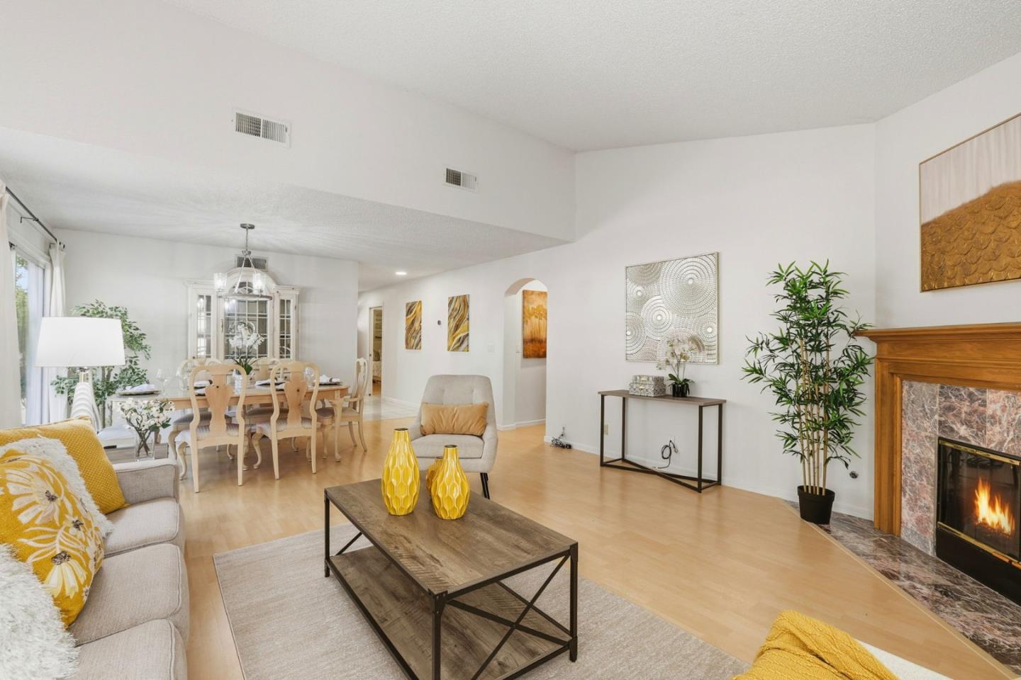 2327 Farmcrest Street Milpitas, CA 95035 - Photo 8 of 36 a living room with furniture and a fireplace