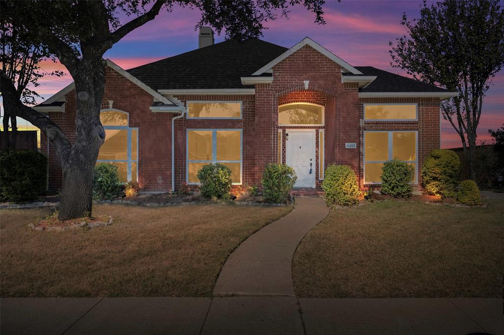 4901 Harborview Boulevard Rowlett, TX 75088 - Photo 1 of 1 a front view of a house with a yard