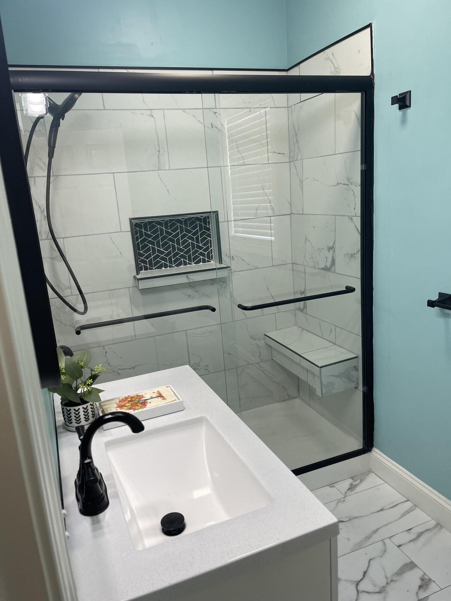 131 Stewart Street, Unit 2 Fall River, MA 02720 - Photo 8 of 15 a bathroom with a sink and a mirror