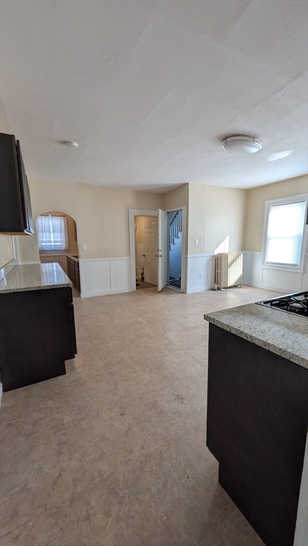 6 Brandon Road, Unit 1 Dudley, MA 01571 - Photo 7 of 14 a living room with furniture and a lamp