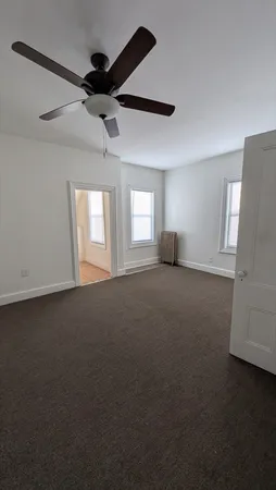 a view of empty room with windows