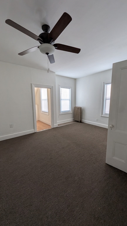 6 Brandon Road, Unit 1 Dudley, MA 01571 - Photo 8 of 14 a view of empty room with windows
