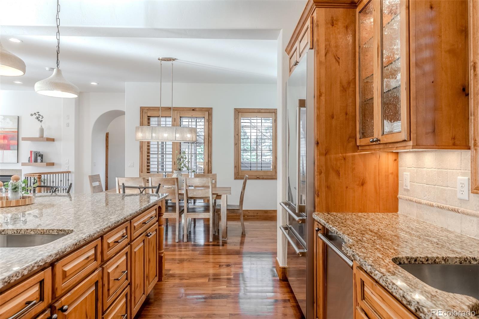2515 South Fillmore Street Denver, CO 80210 - Photo 12 of 39 a very nice looking kitchen with granite countertop a large window