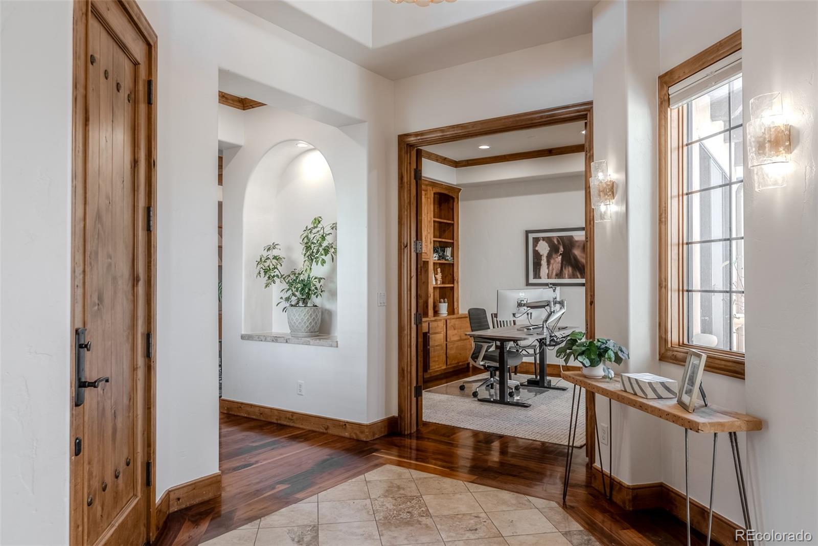 2515 South Fillmore Street Denver, CO 80210 - Photo 4 of 39 a view of a livingroom with furniture and a window