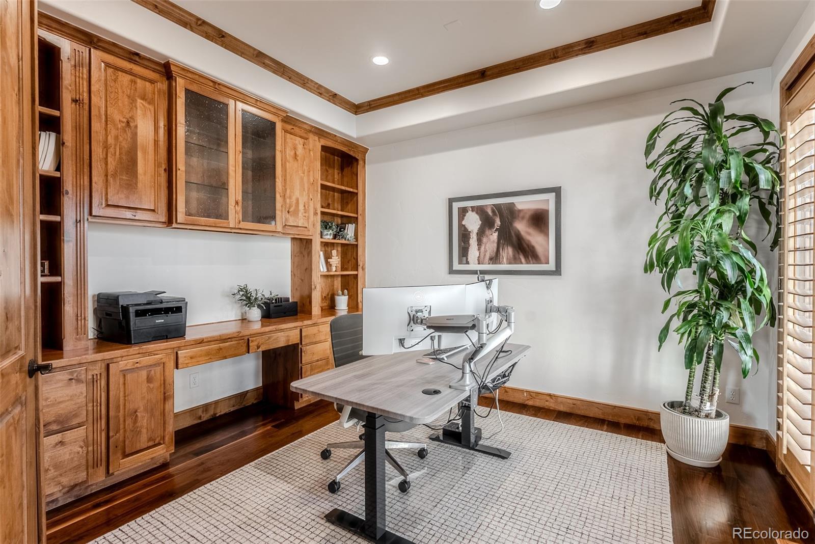 2515 South Fillmore Street Denver, CO 80210 - Photo 5 of 39 a reading room with furniture and a potted plant