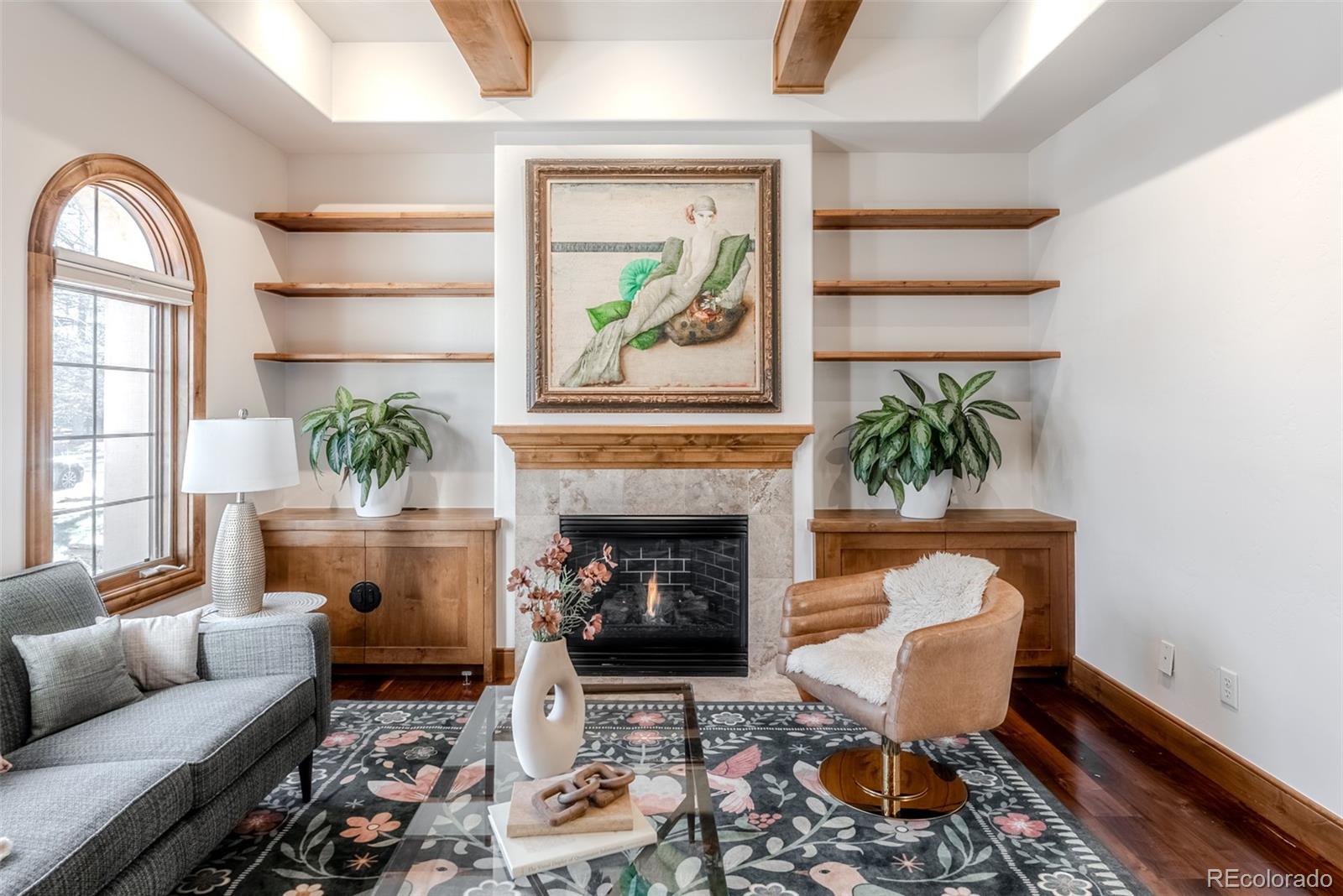 2515 South Fillmore Street Denver, CO 80210 - Photo 7 of 39 a living room with furniture a fireplace and a window