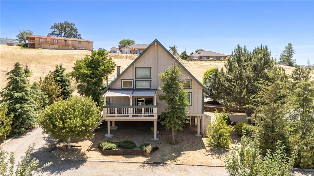 23740 Lakeview Drive Tehachapi, CA 93561 - Photo 2 of 48 a view of a house with roof and sitting area