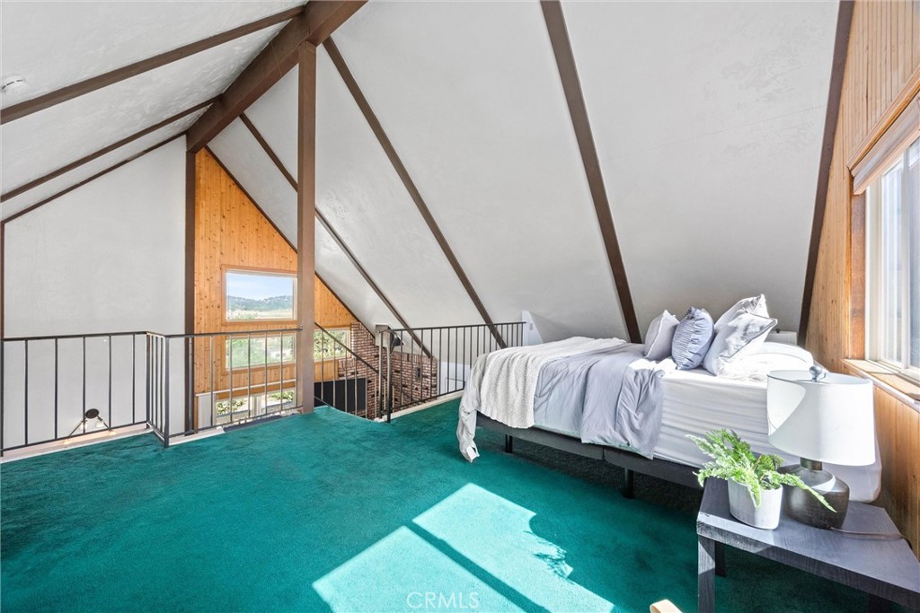 23740 Lakeview Drive Tehachapi, CA 93561 - Photo 26 of 48 a bedroom with bed and a window