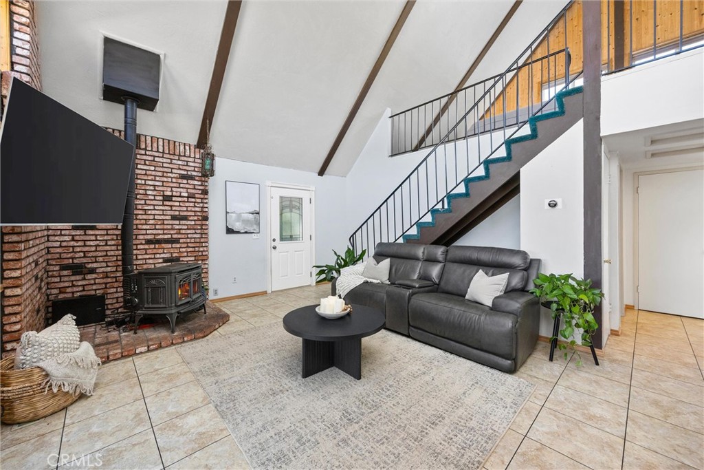 23740 Lakeview Drive Tehachapi, CA 93561 - Photo 9 of 48 a living room with furniture and a flat screen tv