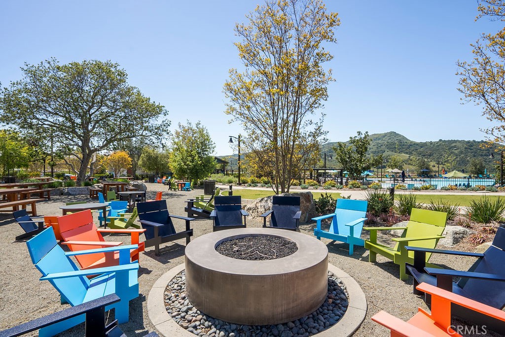 1300 Lasso Way, Unit 305 Rancho Mission Viejo, CA 92694 - Photo 36 of 36 an outdoor living space with furniture and a garden