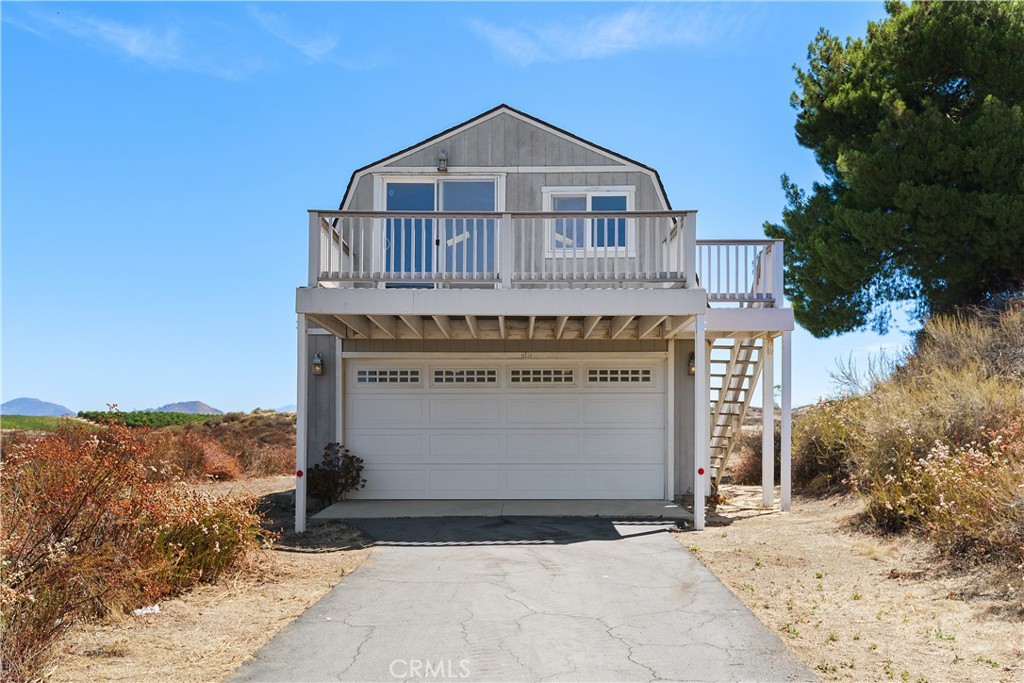 34881 Los Nogales Road Temecula, CA 92592 - Photo 17 of 50 20 X 36 Barn/workshop built in 2006. Closer view of permited barn/ workshop with a loft. Stairs and deck are Trex deck material and in great condition. So much potential!!