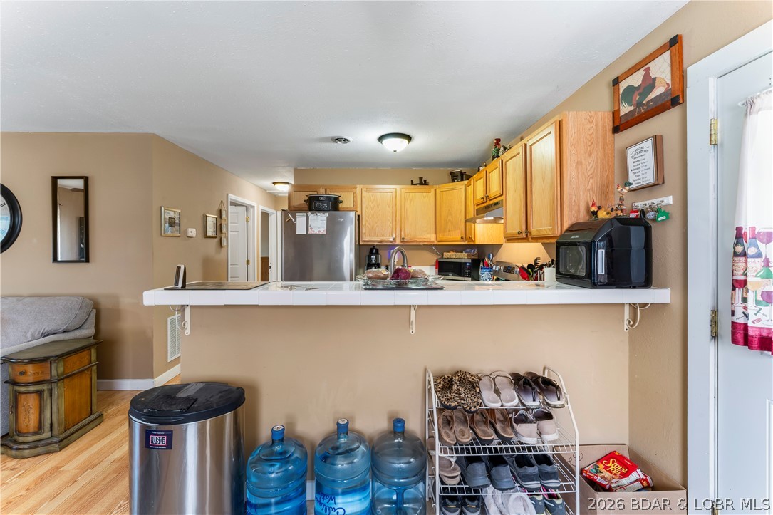 3677 Gentle Slope Road Stover, MO 65078 - Photo 23 of 73 Main House Kitchen Bar