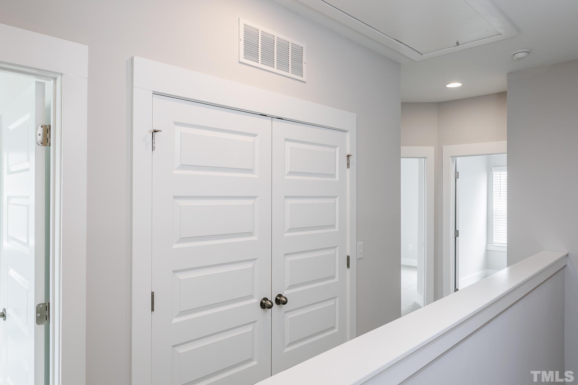 8234 Ebenezer Church Road Raleigh, NC 27613 - Photo 31 of 36 a view of a hallway