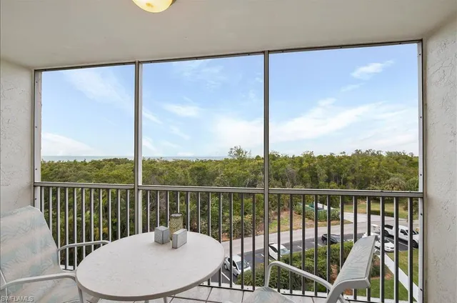 a balcony with a water view