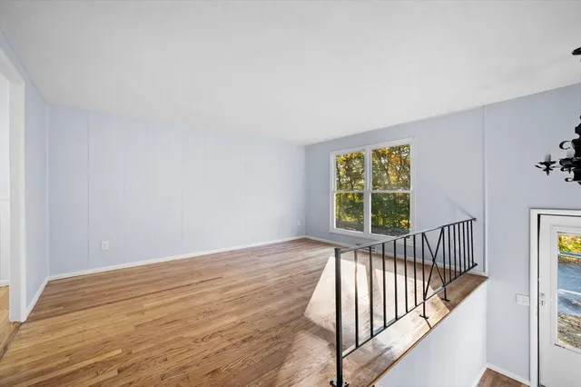 a view of entryway with wooden floor