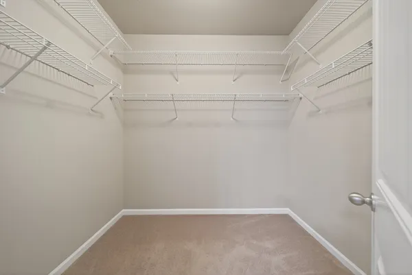 a view of an empty walk in closet