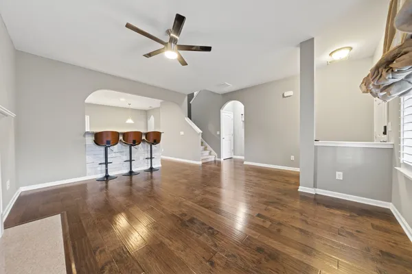 a view of livingroom and hardwood floor
