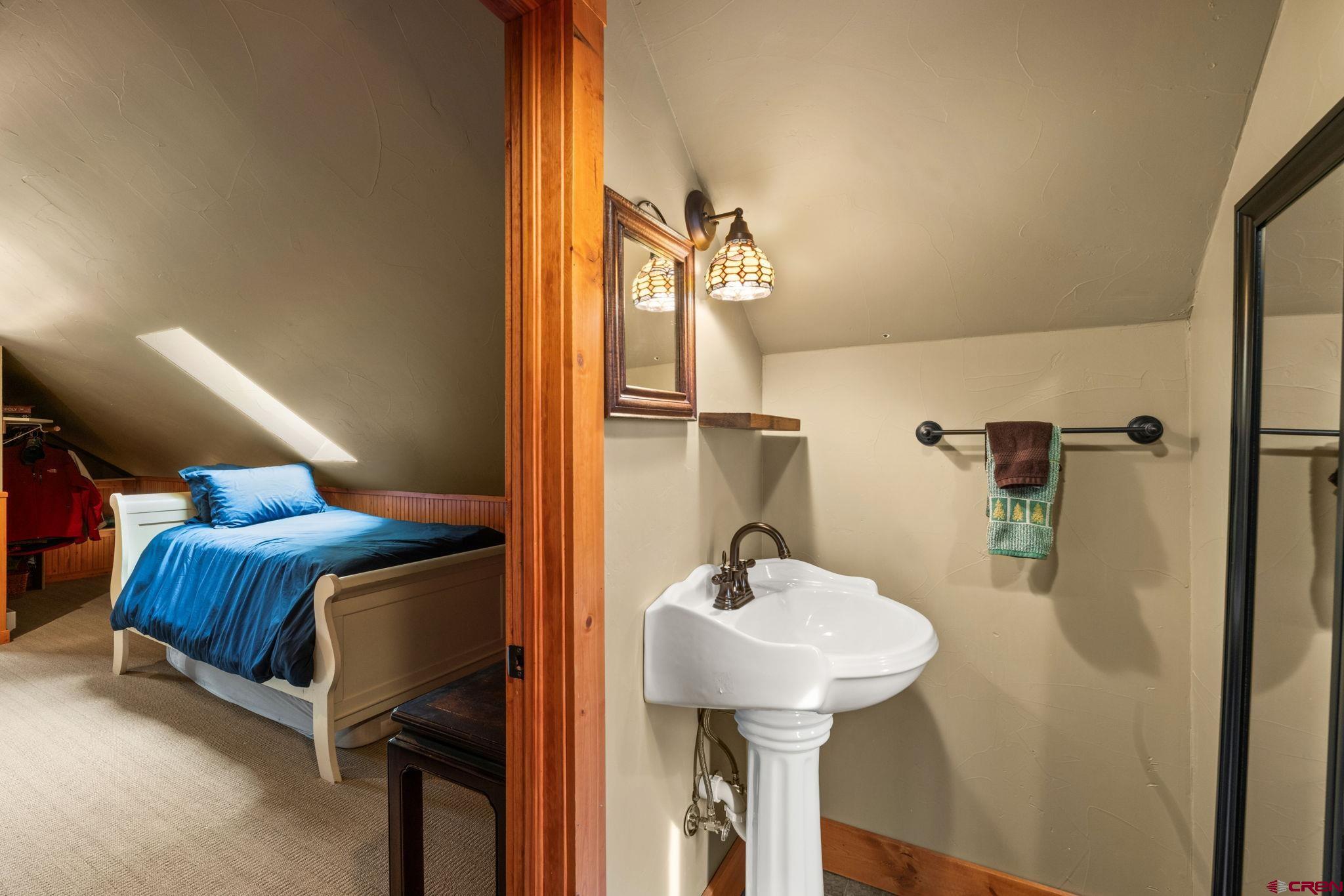 31 Gothic Avenue Crested Butte, CO 81224 - Photo 27 of 33 a bathroom with a sink and a mirror