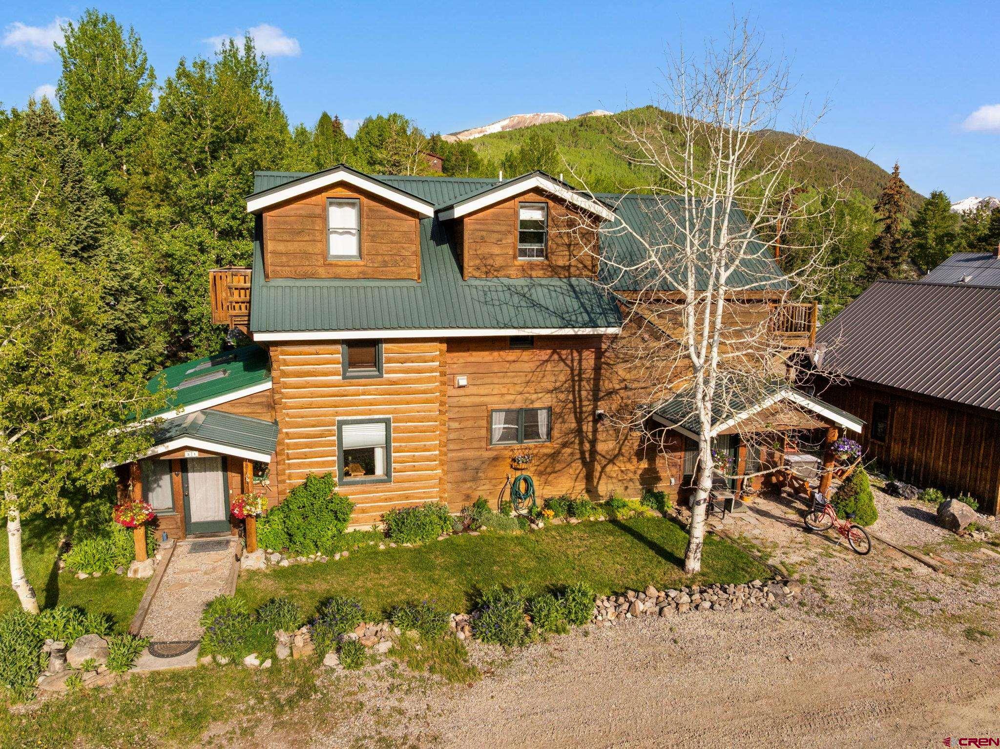 31 Gothic Avenue Crested Butte, CO 81224 - Photo 28 of 33 front view of a house with a yard