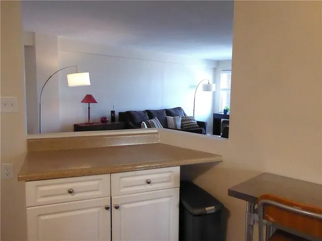 a room with furniture and wooden floor