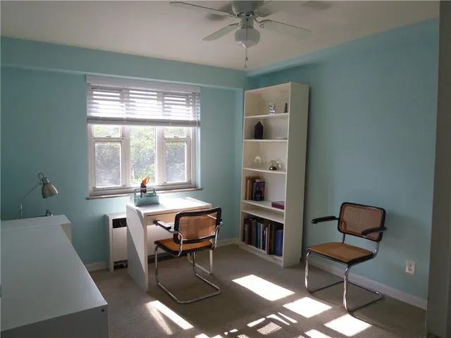 a room with a chair and a table
