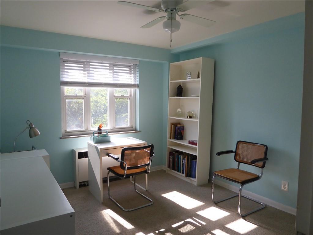 4601 Fifth Avenue, Unit 623 Pittsburgh, PA 15213 - Photo 20 of 28 a view of a workspace with furniture and a window