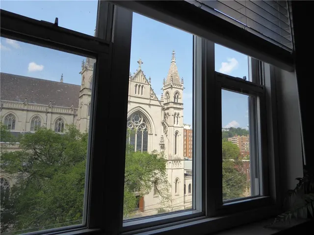 a utility room with cabinets washer and dryer