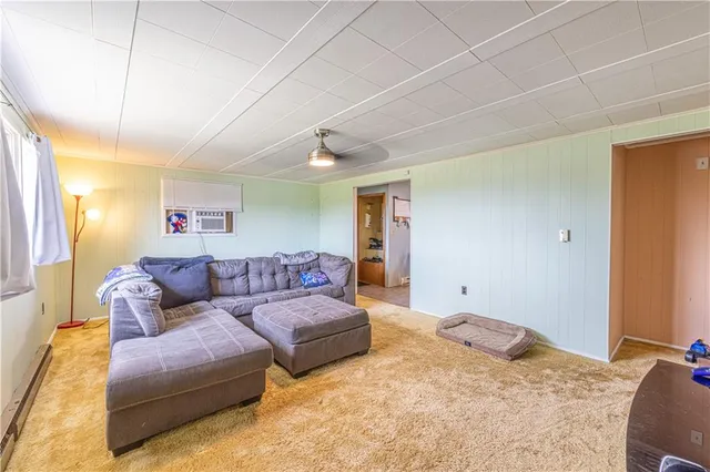 a living room with furniture and a couch