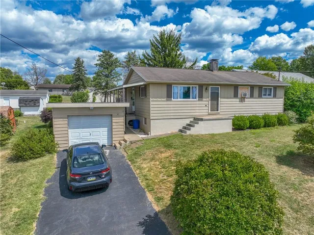a car parked in front of a house
