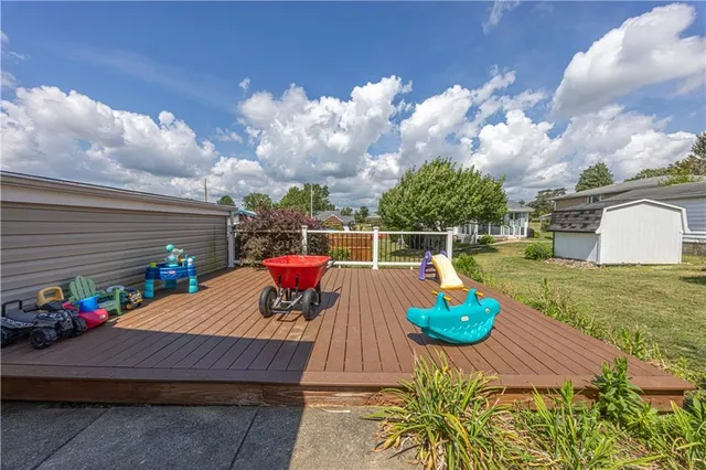 a view of a chairs and table in the patio