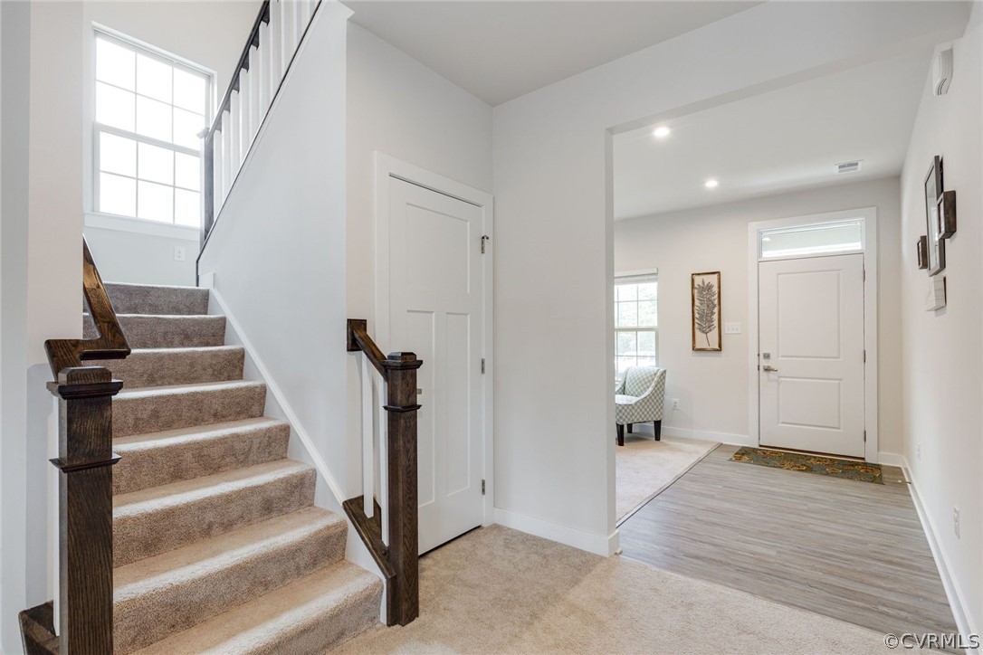 10419 Centralia Station Chester, VA 23831 - Photo 15 of 50 a view of an entryway with wooden floor and a bathroom