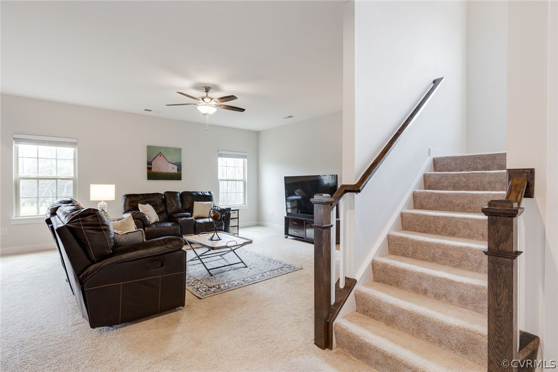 10419 Centralia Station Chester, VA 23831 - Photo 16 of 50 a living room with furniture and a ceiling fan