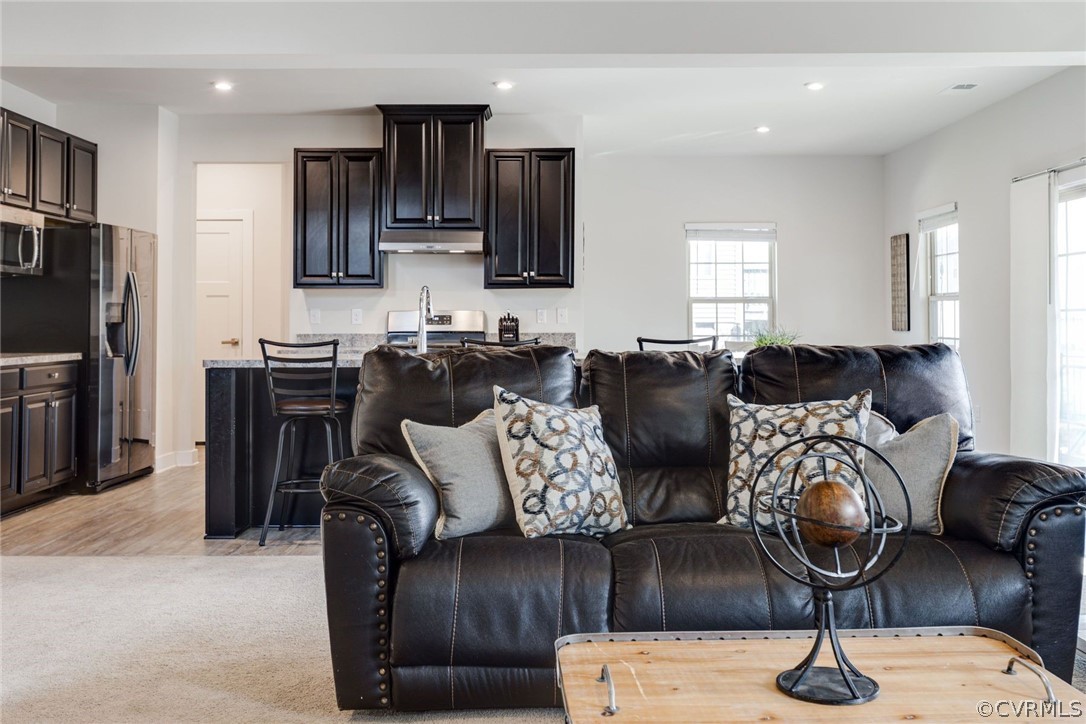 10419 Centralia Station Chester, VA 23831 - Photo 18 of 50 a living room with furniture and a flat screen tv