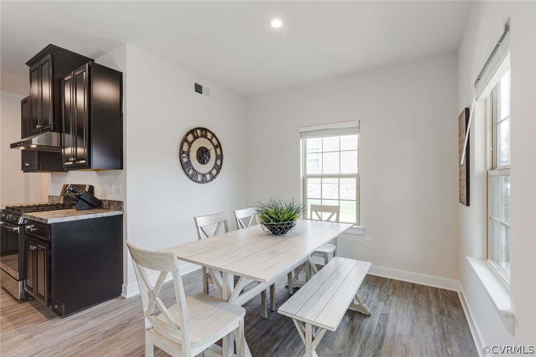 10419 Centralia Station Chester, VA 23831 - Photo 27 of 50 a view of a dining room with furniture window and wooden floor