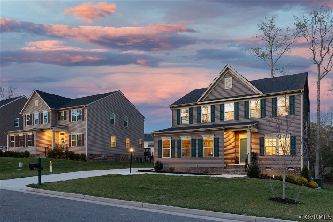 10419 Centralia Station Chester, VA 23831 - Photo 3 of 50 a front view of a house with a yard