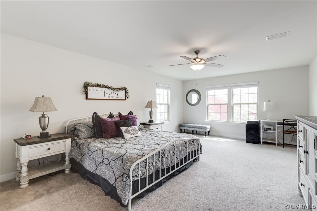 10419 Centralia Station Chester, VA 23831 - Photo 31 of 50 a bedroom with a bed large window and couch
