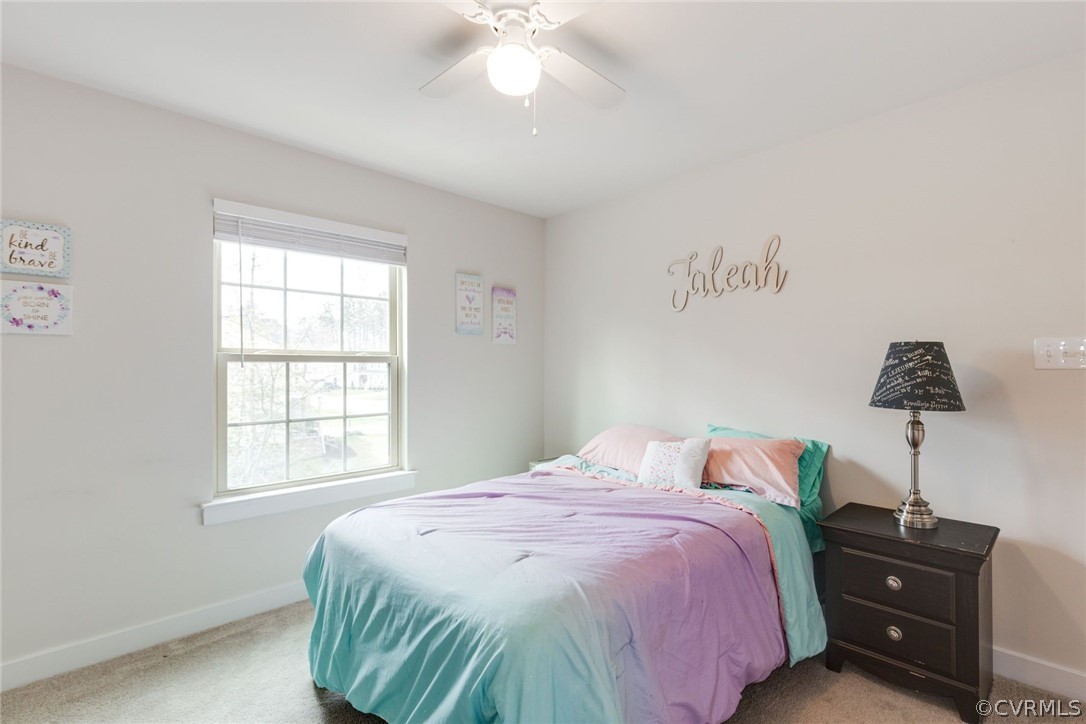 10419 Centralia Station Chester, VA 23831 - Photo 39 of 50 a bedroom with a bed and a window