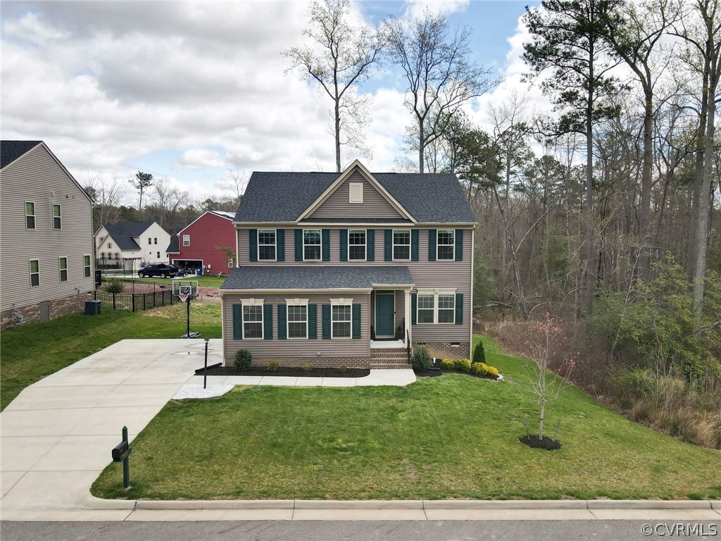 10419 Centralia Station Chester, VA 23831 - Photo 5 of 50 a front view of a house with a yard