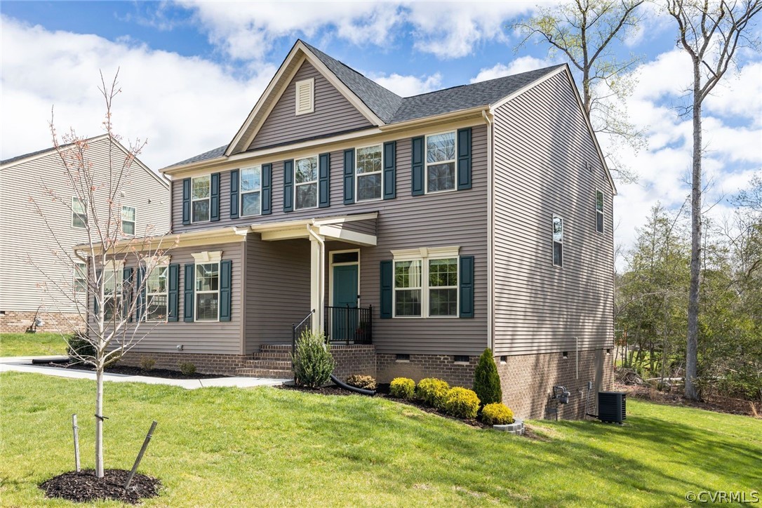 10419 Centralia Station Chester, VA 23831 - Photo 8 of 50 a front view of a house with a yard