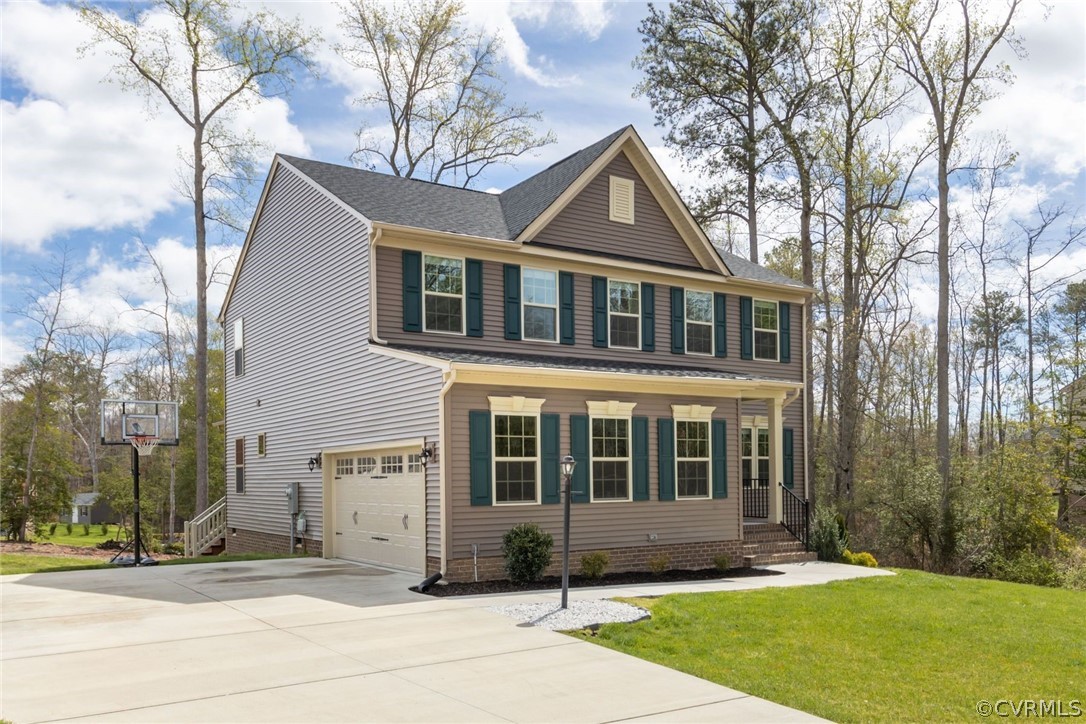 10419 Centralia Station Chester, VA 23831 - Photo 9 of 50 a front view of a house with a yard