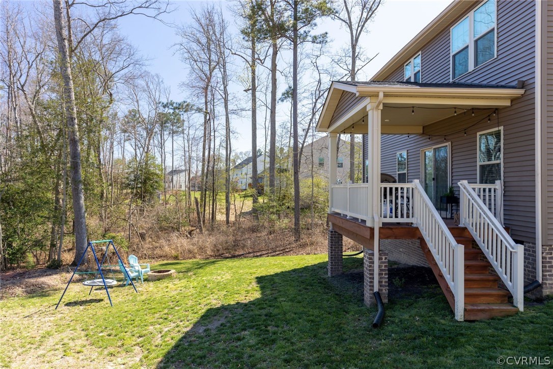 10419 Centralia Station Chester, VA 23831 - Photo 10 of 50 a view of a house with backyard and a slide