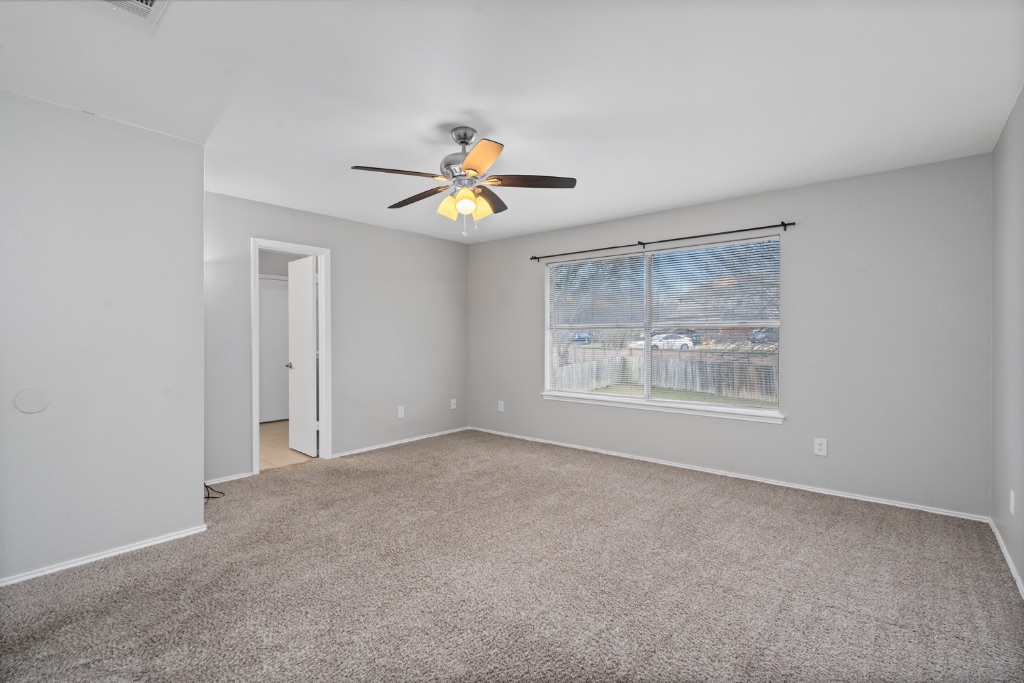 911 Flatters Way Pflugerville, TX 78660 - Photo 14 of 31 a view of an empty room with a window