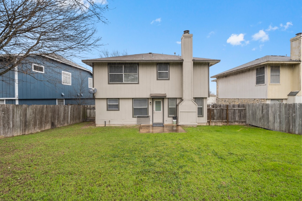 911 Flatters Way Pflugerville, TX 78660 - Photo 30 of 31 a view of a house with a yard and sitting area